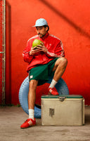 <h4>ADIDAS X BAD BUNNY<br/><em>BALLERINA “VIVID RED”</em></h4>