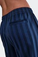 PANTALON NIKE AZUL RAYAS - MUJER