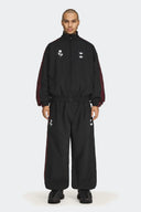 ADIDAS PANTALON WOVEN X WILLY CHAVARRIA
