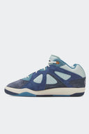 adidas BADBO 1.0 x Bad Bunny Night Navy, vista lateral interior con mediasuela crema