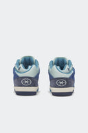 Talón del adidas BADBO 1.0 Night Navy con la estrella inspirada en Puerto Rico