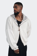 OMERTA ZIP HOODIE BLANCO J BALVIN X RYAN CASTRO