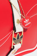 ADIDAS BOLSO ELONGATED AIRLINER X COCA-COLA