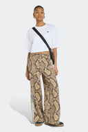 ADIDAS JEAN LOOSE SNAKE - MUJER