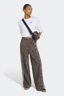 ADIDAS JEAN LOOSE SNAKE - MUJER