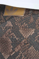 ADIDAS JEAN LOOSE SNAKE - MUJER