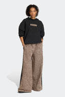 ADIDAS PANTALON DENIM LEOPARD - MUJER