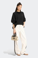 ADIDAS SUETER TEJIDO HOLIDAY NEGRO - MUJER