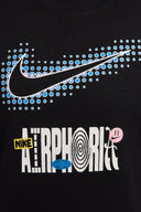 NIKE CAMISETA GRAPHIC - MUJER