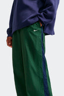 NIKE PANTALON PARACHUTE - MUJER