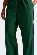 NIKE PANTALON PARACHUTE - MUJER