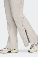 NIKE PANTALON REPEL ZIP - MUJER