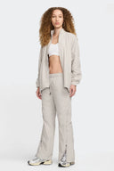 NIKE PANTALON REPEL ZIP - MUJER