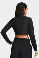 NIKE BLUSA PHOENIX PLUSH - MUJER
