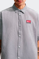 NIKE CAMISETA BUTTOM