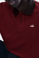 NIKE POLO VINOTINTO