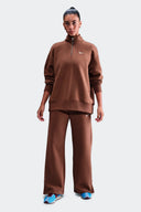 NIKE PANTALON PHOENIX MARRON - MUJER